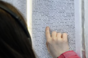 Saskia Edwards-Korolczuk searching the book of names